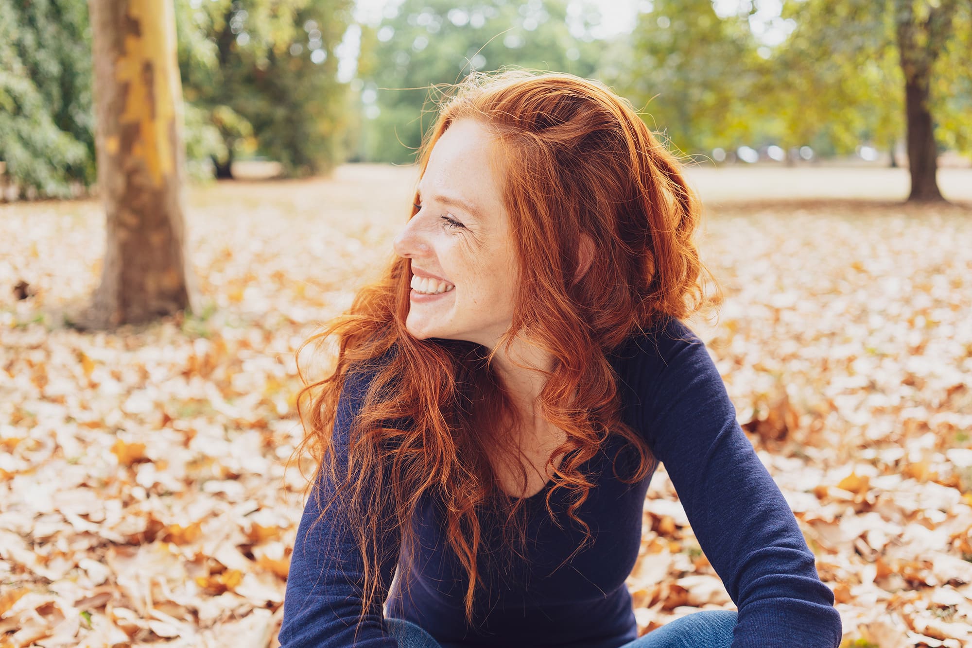 girl smiling in a park